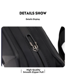 Detail showing high-quality metal zipper and precision stitching on black crossbody bag