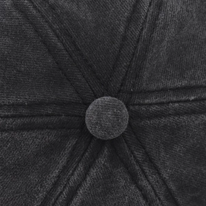Macro shot of charcoal grey washed baseball cap top with detailed 6-panel stitching and button