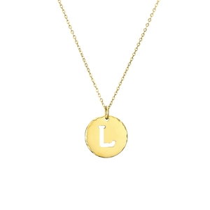 Macro detail of a gold-plated stainless steel round pendant featuring a cutout letter L