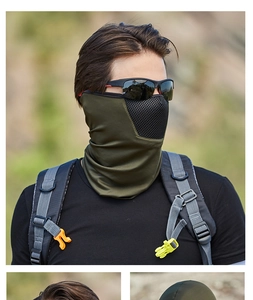 Detail of army green tactical mask with breathable black hexagonal mesh for outdoor riding