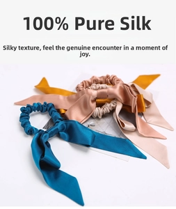 Detail showing high-quality 100% mulberry silk ribbon scrunchies with soft natural luster