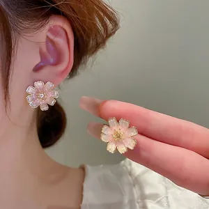 Exquisite handmade cherry blossom stud earrings with pink pearl gradient petals