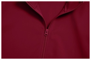 Detail view of the sleek neckline zipper on this dark red seamless yoga sports set