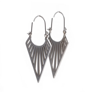 Detail view of hollow triangle earrings in silver finish with stainless steel hooks