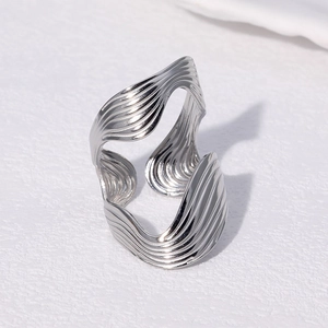 Irregular silver wavy wide band stainless steel ring with fluid metallic texture