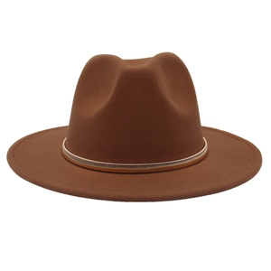 Detailed view of brown felt fedora hat featuring a stylish gold metal band decoration