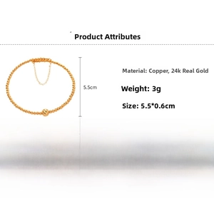 Detail showing 24K gold-plated geometric bead bracelet with adjustable chain link