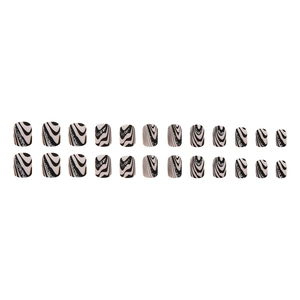 Black and white wavy press-on nails with silver glitter in a squoval shape set