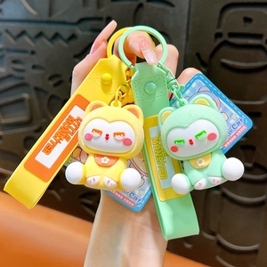Ensemble porte-clés chat floqué mignon avec sangles en caoutchouc pour accessoires de sacs.