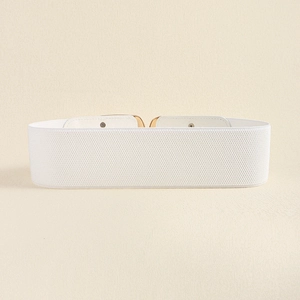 Close-up of white elastic wide waist belt with minimalist gold mirror metal buckle
