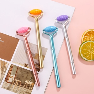 Portable facial massage roller pens in pink, gold, blue, and silver for stress relief