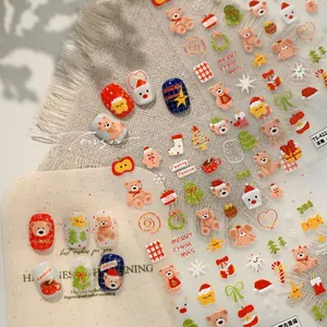 Detailed 5D embossed Christmas nail stickers featuring cute cartoon bears and festive trees