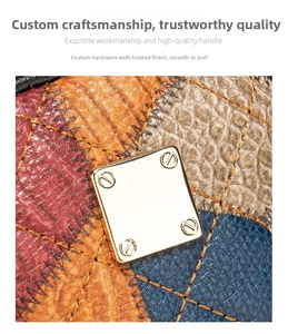 Macro shot of colorful quilted leather patchwork with premium gold square hardware detail