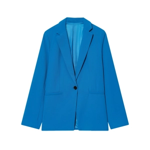 Détail du blazer bleu vif pour femme avec col à revers et fermeture à bouton unique