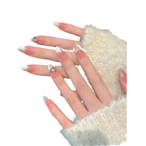 Pink gradient cat-eye press-on nails with silver glitter and rhinestone accents