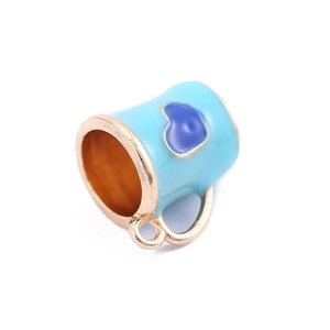 Blue enamel coffee mug pendant with gold metal trim and heart detail for DIY jewelry