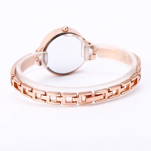 Minimalist rose gold metal chain watch for women featuring an elegant hollow link bracelet