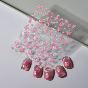 3D pink floral relief nail stickers with green leaves and embossed lettering designs
