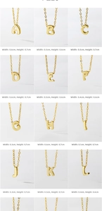 Detailed view of 12 gold initial pendants A-L with size measurements for each letter