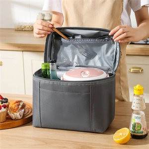 Detail of insulated lunch bag with aluminum foil lining and interior mesh pocket