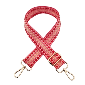 Macro shot of 3.8cm thick colorful gradient geometric woven wide strap with gold clasps