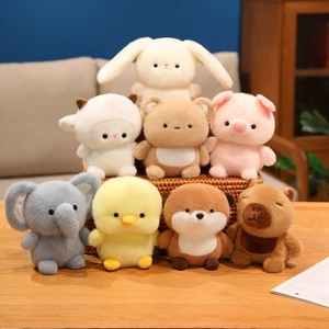 Cute plush animal collection with capybara, bunny, and bear soft toys in cozy setting