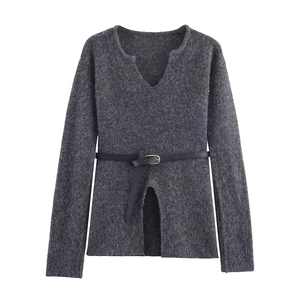 Women's grey V-neck knit sweater with waist belt and side slit detail on white background