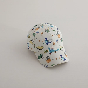Detail of white kids baseball cap featuring colorful cartoon dinosaur prints and Roar text