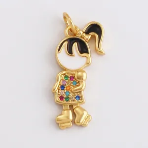 Detail view of a gold girl pendant with black enamel and colorful zircon inlay with measurements