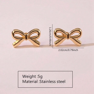 Detail view of golden stainless steel bow earrings with precise size and weight specs