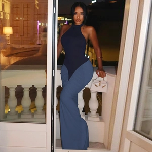 Detail of elegant backless halter neck dark blue jumpsuit for formal evening parties