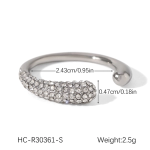 Detail view of silver open ring with dimensions 2.43cm inner diameter and 2.5g weight