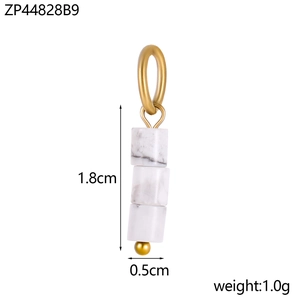 Detailed view of three natural stone abacus beads on a golden pendant DIY accessory