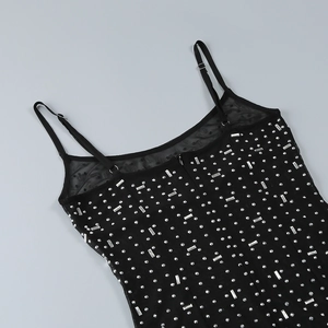 Close-up of black mesh dress with silver rhinestones and adjustable spaghetti straps