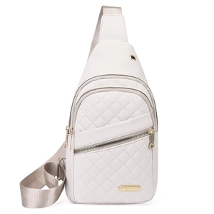 Minimalist white quilted chest bag with adjustable strap and golden hardware