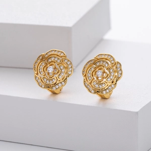S925 silver flower stud earrings with white zircon on white geometric background