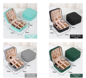 Macro detail of portable jewelry organizers in four colors with inner slots and hooks