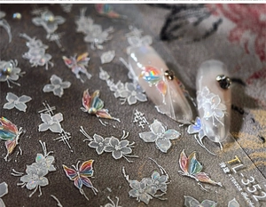 Detailed macro view of TL-352 holographic butterfly lace floral embossed nail art stickers
