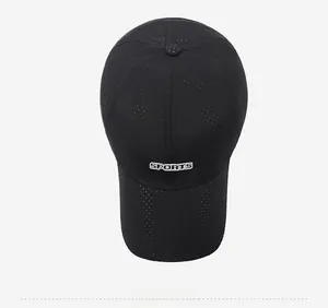 Detail of black breathable mesh sports cap with white SPORTS logo embroidery