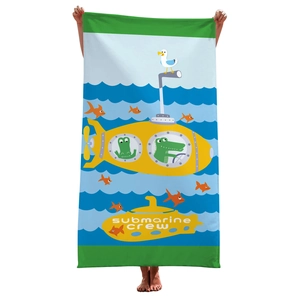 Detail of microfiber beach towel featuring a cartoon yellow submarine and marine life