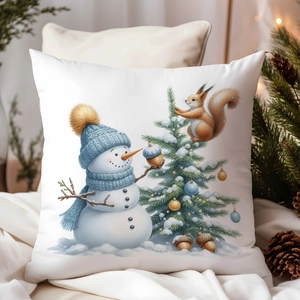 Détail d'une housse de coussin de Noël blanche avec motifs festifs de bonhomme de neige