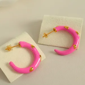 Modern pink enamel C-shaped stainless steel hoop earrings with gold heart patterns