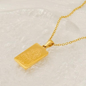 Macro view of 18K gold stainless steel pendant featuring engraved Thousand-Hand Guanyin