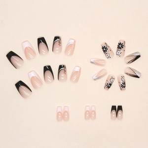 Sparkly black and white French ballet press-on nails with sweet floral designs