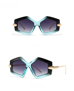 Detail view of large square gradient frame sunglasses with gold metallic textured temples