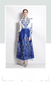 Close-up of elegant French vintage dress with blue and white porcelain floral pattern
