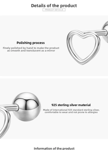 Vue détaillée des boucles d'oreilles cœur en argent 925 avec surface polie miroir
