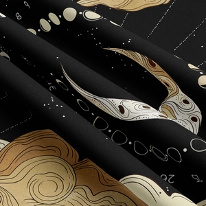 Detailed view of sun and moon tapestry fabric with gold celestial printing and stars