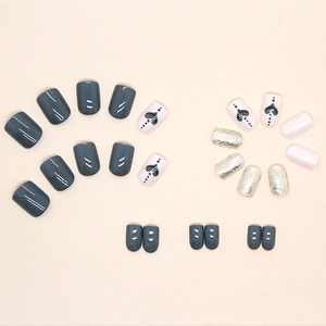 Dark blue and silver glitter press-on nails with heart pattern on short square shape