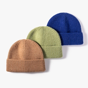 Three cuffed knit beanies in brown, green, and blue with premium ribbed texture